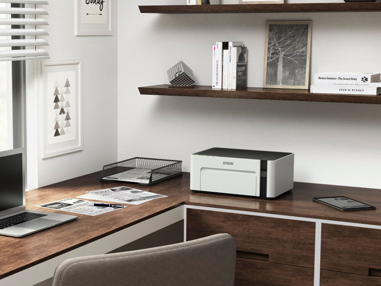 Impresora Epson EcoTank M1120 en un escritorio de oficina