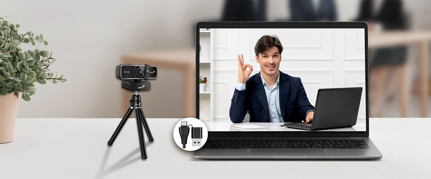 Webcam Genius FaceCam 3000AF sobre trípode conectada a una notebook mediante USB-A y USB-C para videollamadas