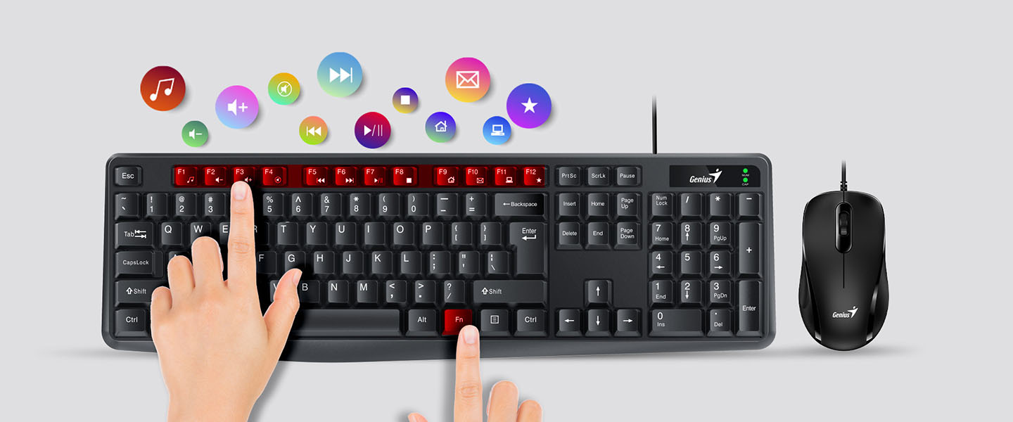 Un Combo de Teclado y Mouse Genius KM-170 USB, ambos sobre un fondo gris. Dos manos están presionando las teclas en el teclado, que tiene teclas FN rojas y el resto negras, con íconos coloridos de aplicaciones multimedia flotando por encima.