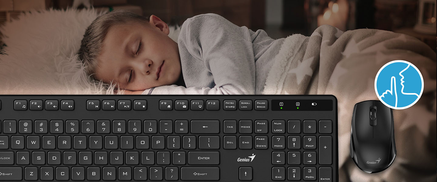 Combo de Teclado y Mouse inalámbrico Genius KM-8206S, con una persona desenfocada en el fondo recostada