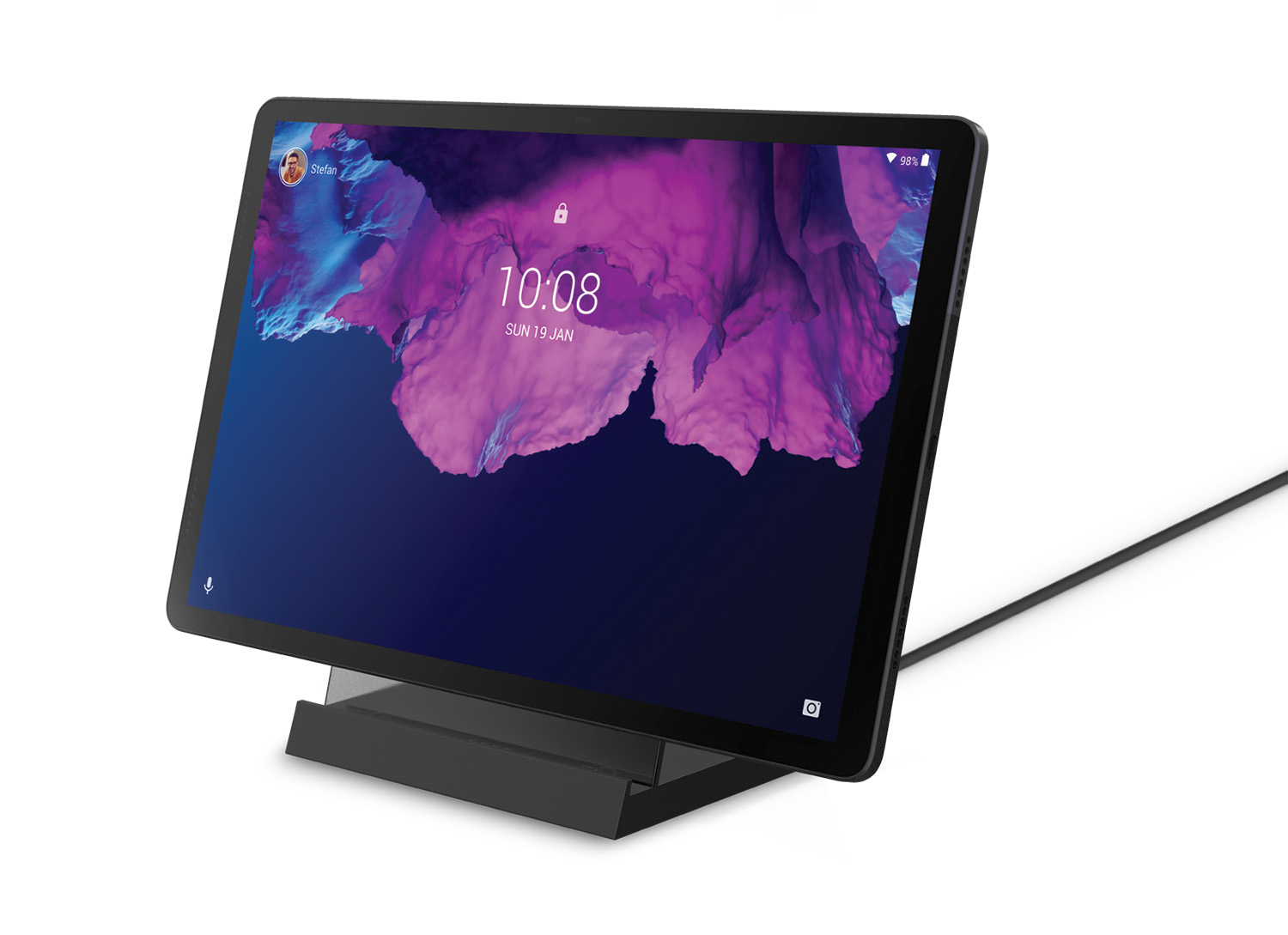 Una tablet Lenovo Tab P11 apoyada en la base de carga, Smart Charging Station 2, sobre un fondo blanco. El nivel de la batería de la tableta es del 98% y la hora que se muestra en la pantalla es 10:08.