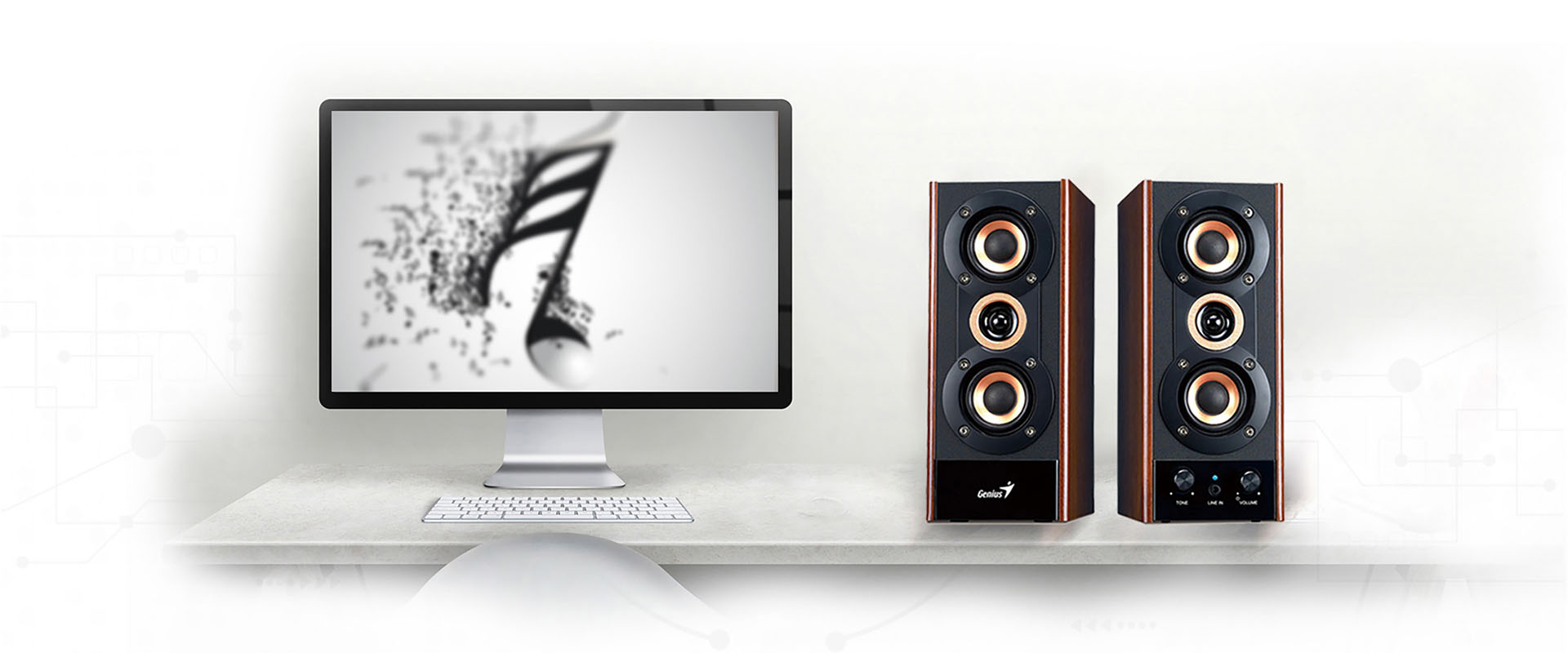 Parlantes Genius SP-HF800A II, junto a una PC, sobre un escritorio