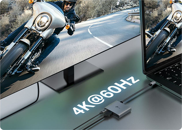 Notebook conectada a un monitor externo mediante un Hub USB-C 3 en 1 TP-Link UH3020C, mostrando una imagen en resolución 4K a 60Hz con perfecta sincronización.