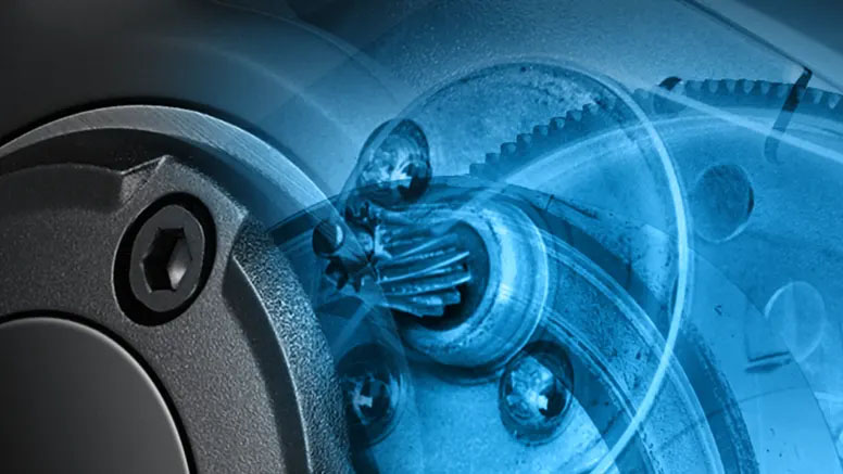 Primer plano de los engranajes helicoidales dentro del volante Logitech G920 con un efecto de rayos X en azul