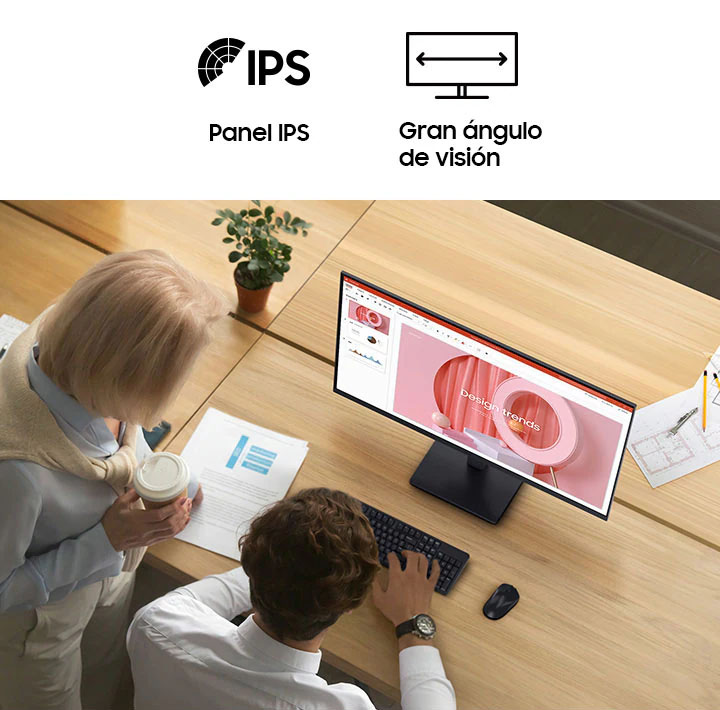 Dos personas trabajando juntas en una oficina moderna, mirando un el Essential Monitor S3 que muestra una presentación de diseño, con documentos y planos sobre escritorios de madera clara. Sobre ellas hay iconos de IPS y de ángulo de visión amplio.